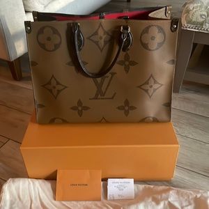 Authentic Louis Vuitton Reverse Monogram Giant GM Brown On The Go. Rarely used!